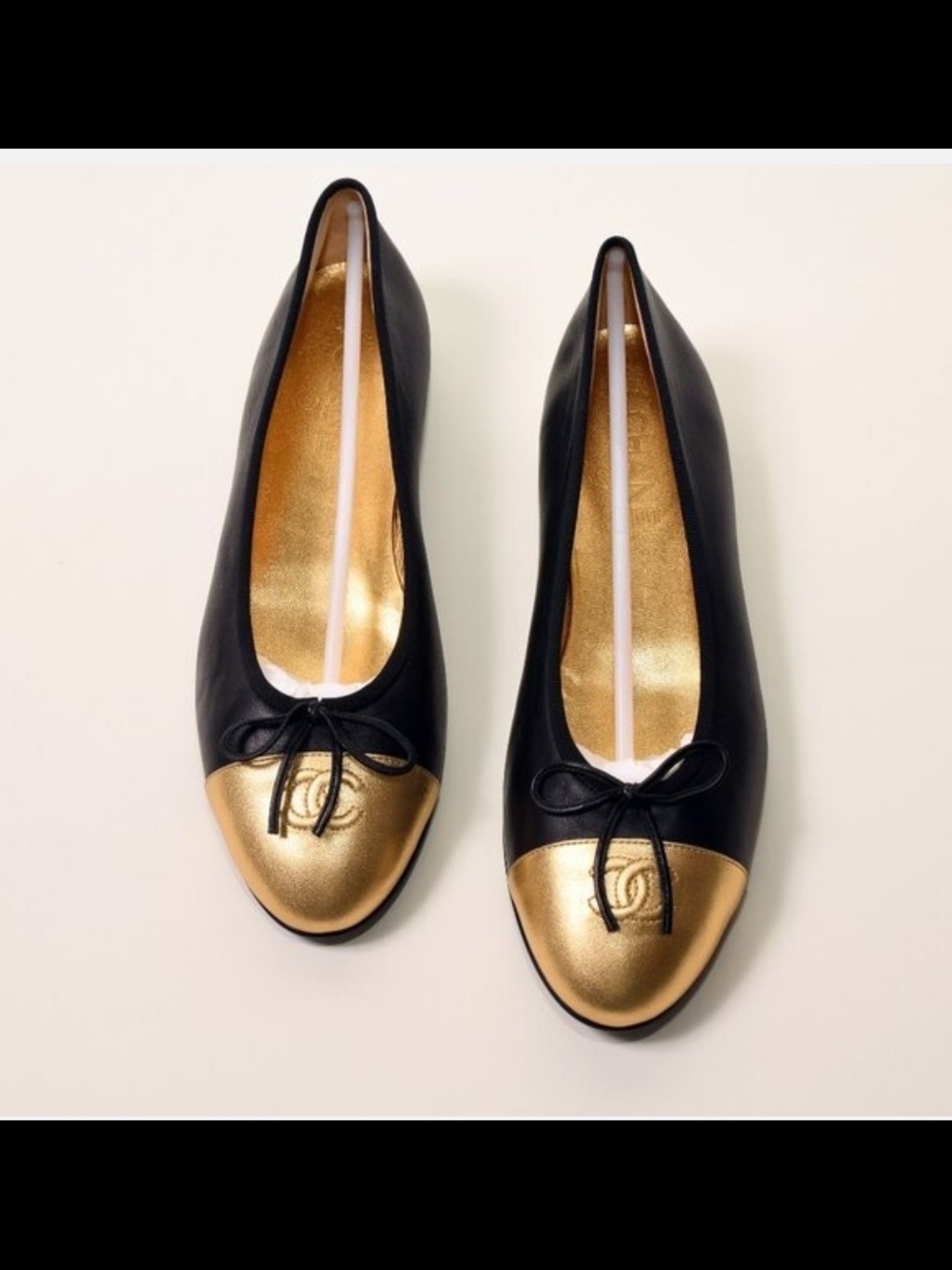 CHANEL Black & Gold Leather Ballet Flats with Metallic Cap Toe